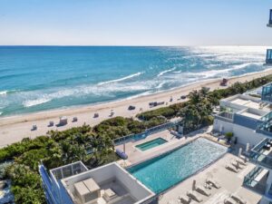 Two heated outdoor pools at Monte Carlo Miami Beach short-term rental, 6551 Collins Avenue Heated outdoor pool at Monte Carlo short-term rental, Miami Beach Fully furnished bedroom with ocean views at Monte Carlo by Miami Vacations Direct beach access at Monte Carlo, 65th and Collins Avenue, Miami Beach Full kitchen in 1-bedroom oceanfront apartment at Monte Carlo Miami Beach
